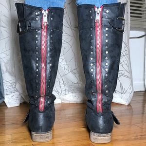 Under the knee, distressed boot.